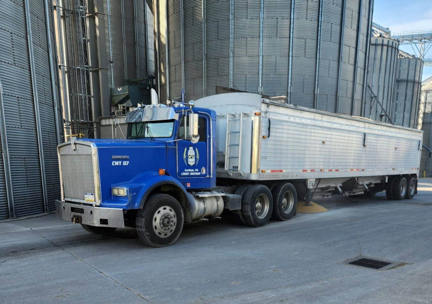 Ag commodities — grain hopper trailer at the elevator.